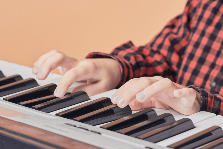 The Research-Backed Benefits Of Piano Lessons